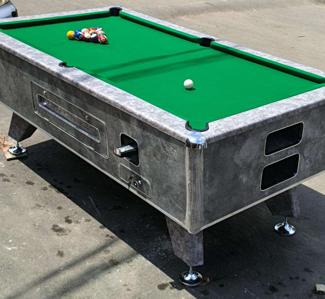 Coin snooker board with balls racked